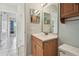 Bathroom featuring a mirror and a wooden vanity at 1944 Hastings Ln, Clearwater, FL 33763