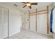 Bedroom with tiled floors and ceiling fan at 1944 Hastings Ln, Clearwater, FL 33763