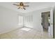 The bedroom features a window and closet offering comfort and convenience at 1944 Hastings Ln, Clearwater, FL 33763