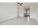 Open-concept living space with tile floors leading to front door and other rooms at 1944 Hastings Ln, Clearwater, FL 33763
