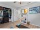 Organized bedroom with a closet, wood floors, and an adjacent bathroom at 2136 Cunningham Dr, Clearwater, FL 33763