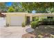 Charming single-Gathering home with a well-manicured lawn, a driveway, and a welcoming front door, creating a warm and inviting appeal at 2136 Cunningham Dr, Clearwater, FL 33763