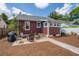 Cozy backyard featuring patio seating, a grill, and a well-maintained lawn at 2723 8Th N Ave, St Petersburg, FL 33713
