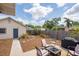 Expansive backyard with mature trees, a cozy firepit area, and ample space for relaxation and recreation at 2723 8Th N Ave, St Petersburg, FL 33713
