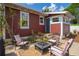 Inviting backyard patio featuring a fire pit and comfortable seating, perfect for outdoor gatherings at 2723 8Th N Ave, St Petersburg, FL 33713
