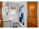 Bright bathroom with vintage-style sink, updated shower with subway tile, and hex tile floors at 2723 8Th N Ave, St Petersburg, FL 33713