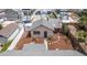Charming home featuring a well-maintained yard, complemented by a modern gray roof and neutral paint at 2723 8Th N Ave, St Petersburg, FL 33713