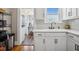 Well-lit white kitchen showcasing a sink and modern fixtures at 2723 8Th N Ave, St Petersburg, FL 33713