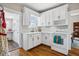 Clean white kitchen featuring quartz countertops and stainless-steel appliances at 2723 8Th N Ave, St Petersburg, FL 33713