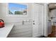 View of mud room, hooks, and access to the kitchen at 2723 8Th N Ave, St Petersburg, FL 33713