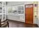 Sunlit room with built-in shelving and lots of natural light from surrounding windows at 2723 8Th N Ave, St Petersburg, FL 33713