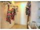 Walk-in closet with wire shelving and colorful array of clothing at 313 Oak Crest Dr, Safety Harbor, FL 34695