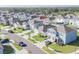 An aerial view reveals a well-kept community, attractive landscaping, and desirable street appeal at 33488 Elm Hill Br, Wesley Chapel, FL 33545