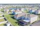 This aerial view shows a desirable community close to a scenic pond at 33488 Elm Hill Br, Wesley Chapel, FL 33545