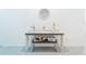 Hallway decorated with furniture, mirror, a table, and matching decor at 33488 Elm Hill Br, Wesley Chapel, FL 33545