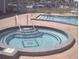Relaxing hot tub with easy access steps offering a serene spot for residents to unwind and socialize at 34041 Azalea N Dr, Pinellas Park, FL 33781