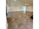 Bright open room with tile floors and recessed lighting, perfect for entertaining and relaxation at 3504 Crooked River Dr, Plant City, FL 33565
