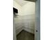 Walk-in pantry with wire shelving, offering ample storage space at 3504 Crooked River Dr, Plant City, FL 33565
