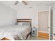 This comfy bedroom features a ceiling fan, natural lighting, and access to the rest of the home at 3966 High Bluff Dr, Largo, FL 33770