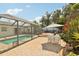 Outdoor patio area within screened lanai, perfect for outdoor dining at 3966 High Bluff Dr, Largo, FL 33770