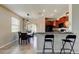 Kitchen area with breakfast bar and access to dining area at 4023 Wild Senna Blvd, Tampa, FL 33619