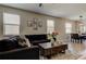 Spacious living room with modern decor and abundant natural light at 4023 Wild Senna Blvd, Tampa, FL 33619