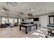 View of rec room with billiards table, and multiple seating areas at 4023 Wild Senna Blvd, Tampa, FL 33619