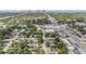 Scenic aerial view of neighborhood homes and streets, with downtown skyline in distance and ample greenery at 4205 N Suwanee Ave, Tampa, FL 33603