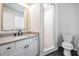 Stylish bathroom featuring a single sink vanity with quartz counters and a subway tile shower at 4205 N Suwanee Ave, Tampa, FL 33603