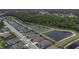 Neighborhood aerial view showing the home's proximity to a pond and other community amenities at 4239 Woodland Retreat Blvd, New Port Richey, FL 34655