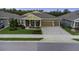Charming single-Gathering home with a well-manicured lawn and two-car garage at 4239 Woodland Retreat Blvd, New Port Richey, FL 34655