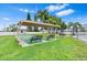 Community shuffleboard courts and picnic tables for residents to enjoy at 4309 Cedar Grove St, Holiday, FL 34691