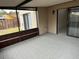Enclosed patio area offers a versatile and relaxing outdoor space at 4309 Cedar Grove St, Holiday, FL 34691