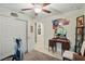 Bedroom with ceiling fan, closet, and vanity area at 5153 Bayley St, North Port, FL 34288