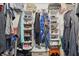 Organized walk-in closet with shelving, hanging rods, and storage solutions at 5153 Bayley St, North Port, FL 34288