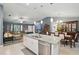 Open-concept living area seamlessly connects kitchen, living, and dining spaces at 5153 Bayley St, North Port, FL 34288
