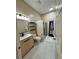 Modern bathroom featuring a floating vanity and glass shower at 6213 Ashfield Pl, Wesley Chapel, FL 33545