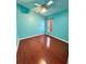 Bedroom featuring a ceiling fan and hardwood floors at 6213 Ashfield Pl, Wesley Chapel, FL 33545