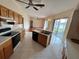 Open concept kitchen with island and appliances at 6213 Ashfield Pl, Wesley Chapel, FL 33545