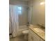 Bathroom featuring a shower with tile surround, granite vanity, and tile floors at 639 48Th N Ave, St Petersburg, FL 33703
