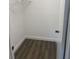 Walk-in closet featuring luxury vinyl floors and ample storage space at 639 48Th N Ave, St Petersburg, FL 33703