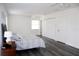 Spacious bedroom with hard wood floors, large windows and closet at 6508 Lenore Dr, Tampa, FL 33634