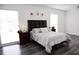 Bright bedroom with two windows and a comfortable bed setting at 6508 Lenore Dr, Tampa, FL 33634