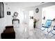 Spacious living room features marble floors, white walls, and minimalist decor at 6508 Lenore Dr, Tampa, FL 33634