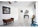 Bright living room with marble floors, white walls, and minimalistic decorations at 6508 Lenore Dr, Tampa, FL 33634