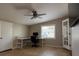 Office space with large window, desk, and tile flooring at 6527 S West Shore Cir, Tampa, FL 33616