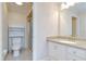 Bathroom featuring a toilet, standing shower, and granite countertop at 6550 Teak Ct, Zephyrhills, FL 33542