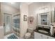 Cozy bathroom with neutral colors and a shower curtain at 709 Grand Canyon Dr, Valrico, FL 33594