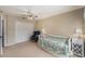 This inviting bedroom offers a spacious closet, comfortable bed, side table, and a cozy accent chair at 709 Grand Canyon Dr, Valrico, FL 33594