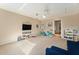 Neutral bonus room featuring a TV, shelves and space for activities at 709 Grand Canyon Dr, Valrico, FL 33594